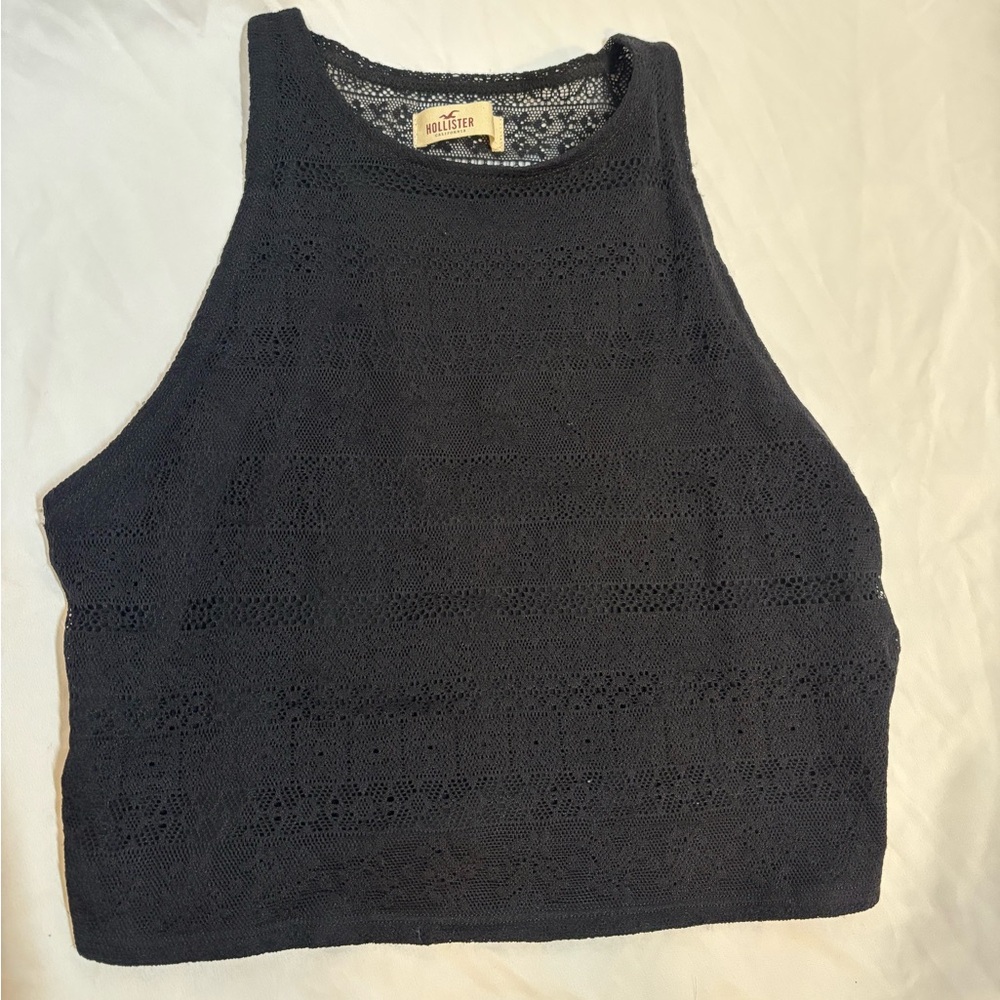 Never worn, Black,lace -like  racer back style, crop top